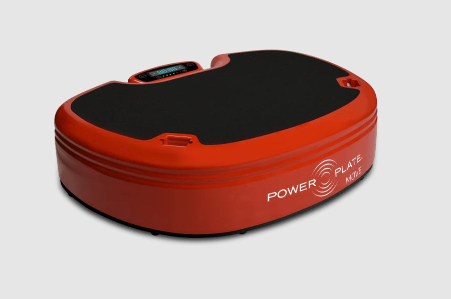Red Power Plate MOVE vibration trainer with black top surface and digital display, on white background
