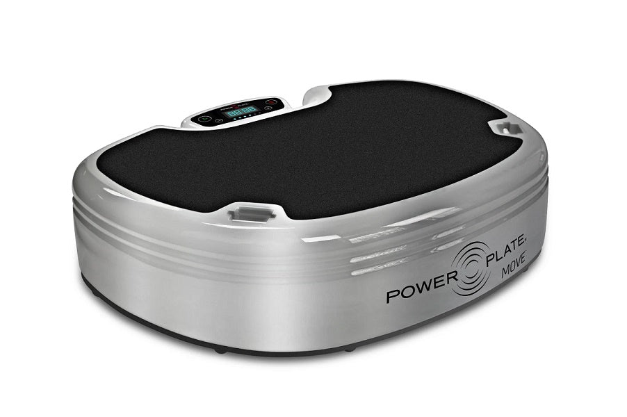 Power Plate MOVE vibration trainer with silver and black design, digital control panel on top, viewed from above on white bac