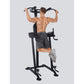 Black vertical power tower with pull-up bar, dip station, and leg raise attachment, demonstrated by shirtless male model on g