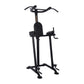 Black vertical power tower with dual handles, padded seat, leg extension platform, and stabilizing feet on white background
