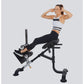 Woman wearing white and navy sports bra and black leggings using black Powertec dual hyperextension/crunch machine on gray ba