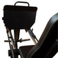Black diamond-plate leg press machine with padded seat, metal frame, and adjustable foot platform on white background