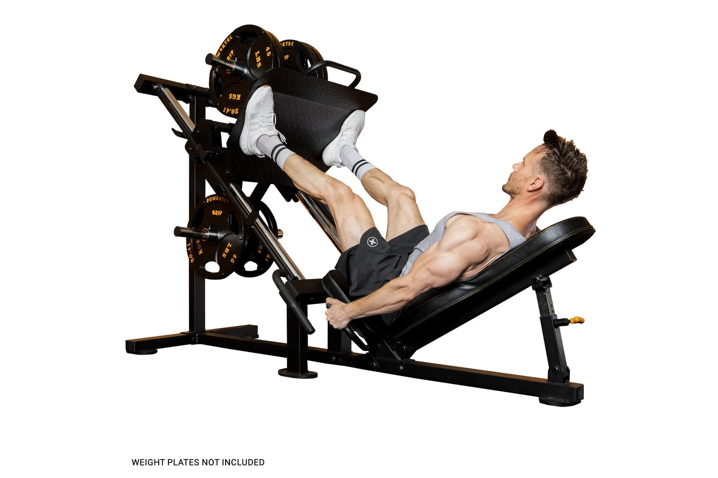 Black and gold leg press machine with padded seat, demonstrating exercise position with male model using equipment