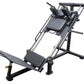 Black and silver leg press hack squat combo machine with padded seat and footplate on white background