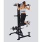 Black multi-station home gym with chin-up and dip bars, worn by woman demonstrating leg raise exercise on white background