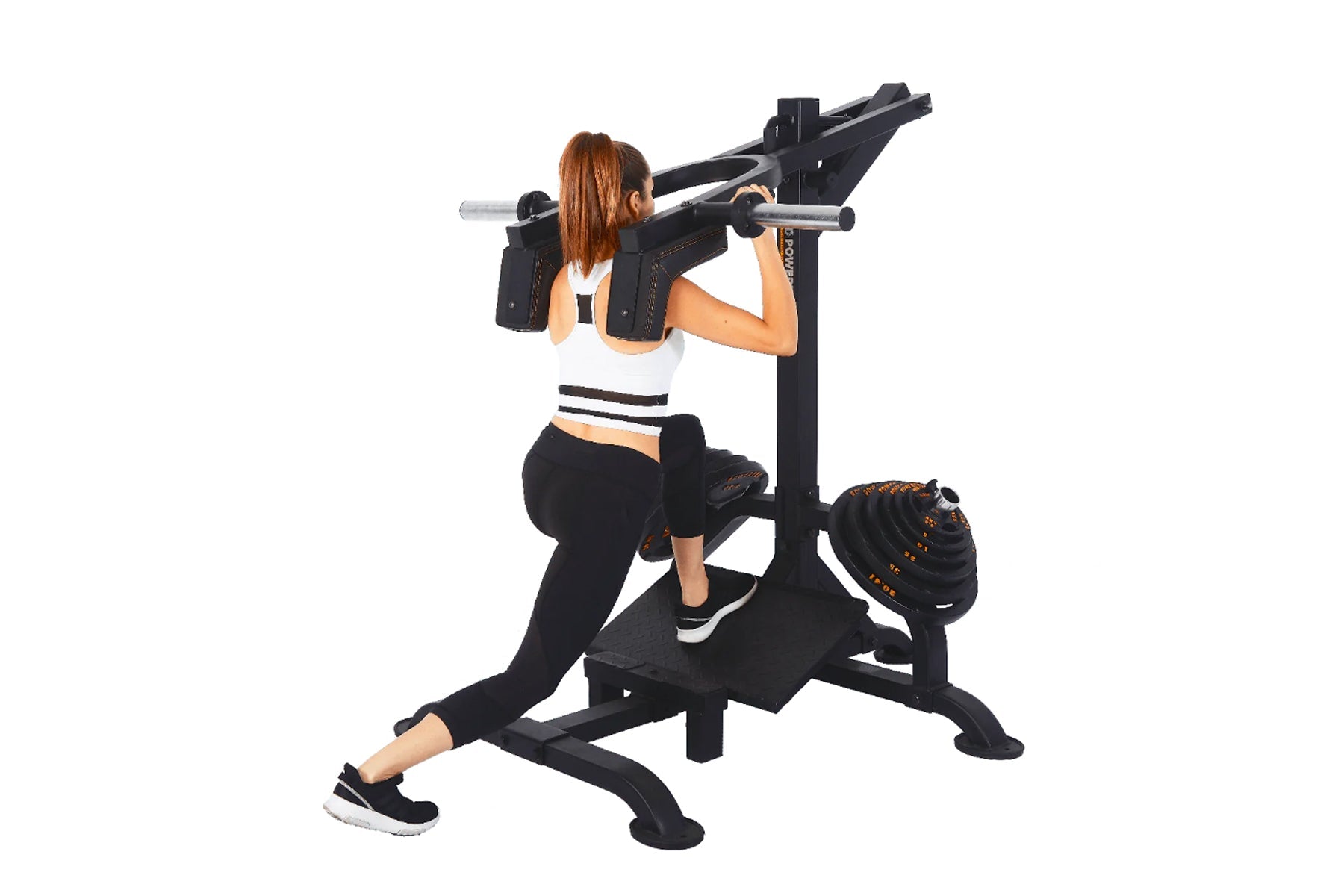 Woman using black Powertec LeverGym squat and calf assist machine with shoulder pads and weight plates, worn by model on whit