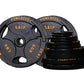 Powertec Grip black cast iron Olympic weight plates with gold text, displayed with two plates and stacked plates showing vari