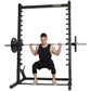 Black Powertec smith machine with loaded barbell, demonstrating squat exercise with model on white background
