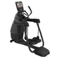 Black elliptical exercise machine with digital console display, dual handles, and pedal platform on white background