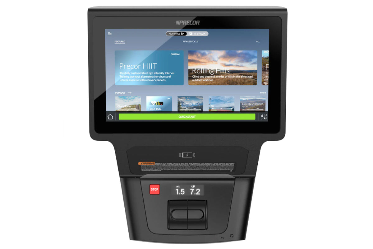 Precor AMT 885 Adaptive Motion Trainer with P84 console displaying fitness workout programs on black touchscreen display