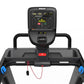 Black Precor treadmill with digital console displaying metrics, yellow graph visualization, red emergency stop button, and bl