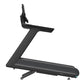 Black motorized treadmill with Z-shaped frame, digital console, and textured running belt on white background