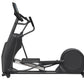 Black elliptical machine with digital console, large circular footplate, and dual handles on white background