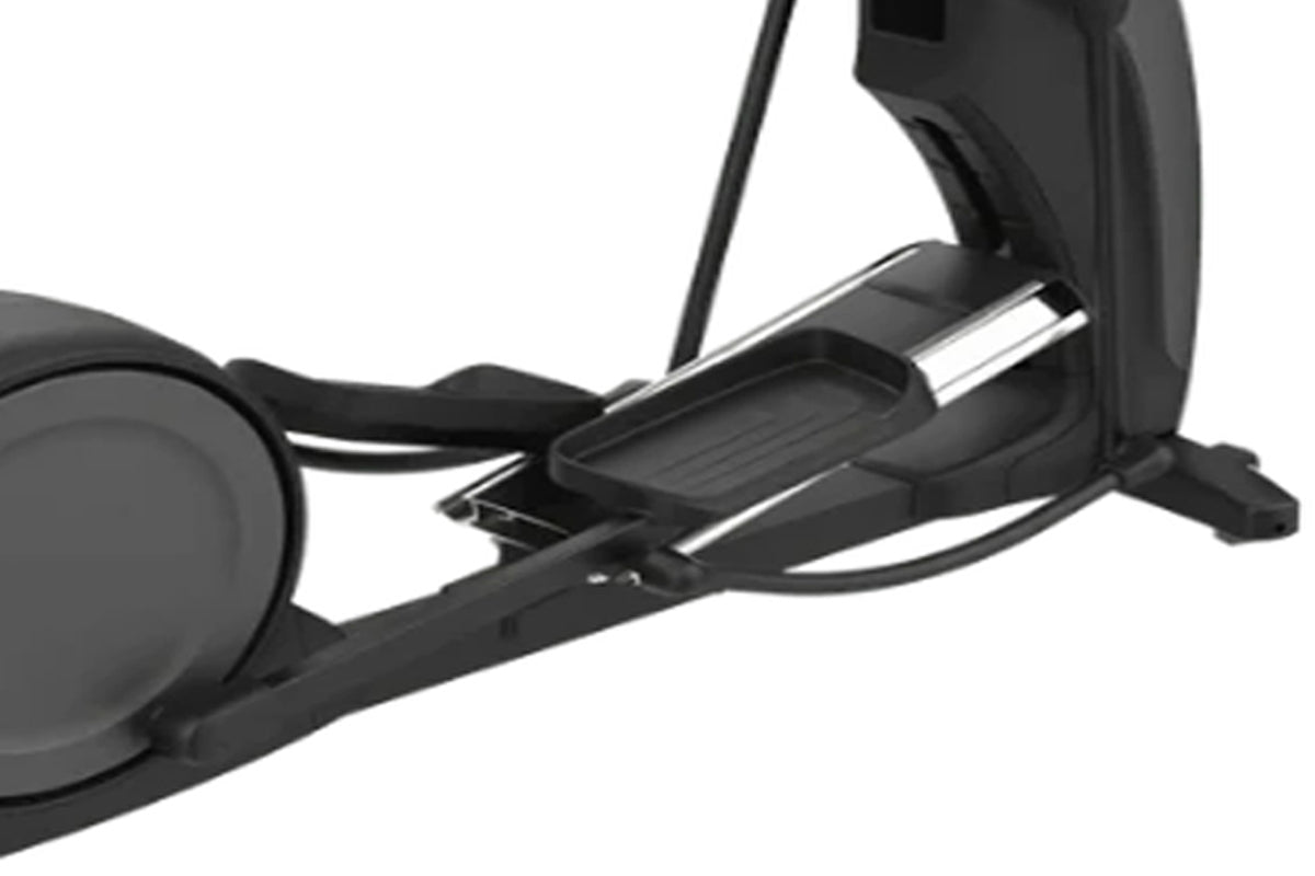 Black elliptical machine with chrome accents and foot pedals, shown at an angle on white background