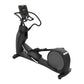 Black elliptical machine with digital console and curved handles on white background