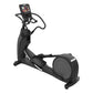 Black Precor elliptical machine with digital console display, curved handlebars, and large front wheel on white background