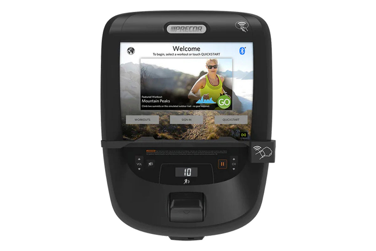 Black Precor RBK 800 recumbent exercise bike with touchscreen display showing welcome workout menu, control buttons, and digi