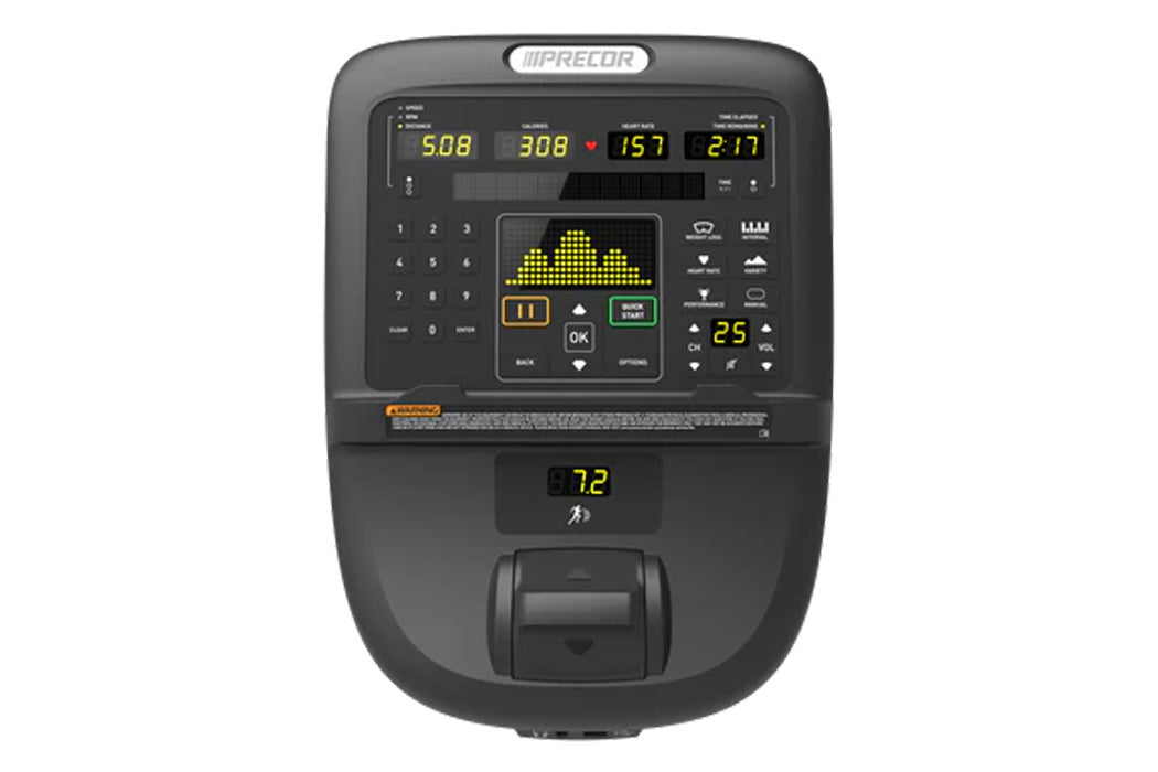 Precor RBK 835 recumbent exercise bike with P31 console displaying digital readouts and yellow-green dot matrix display showi