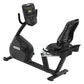 Black recumbent exercise bike with digital console displaying workout metrics, mesh backrest, and extended footrest on white 