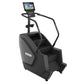 Black Precor stair climber with dual handrails, wide footplate, and integrated display console showing workout metrics on whi