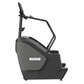 Precor SCL 885 black stair climber with gray accent panels and fixed handlebars on white background