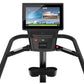 Precor SCL 885 stair climber with black frame, dual handles, and digital console displaying workout content on white backgrou