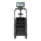 Black stair climber machine with digital display console and dual handrails, front view on white background