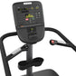 Precor SCL 895 black stair climber with digital console displaying workout metrics, handles, and foot pedals on white backgro