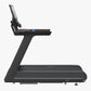 Black Precor Breakaway STM 897 treadmill with digital console and angled running deck on white background