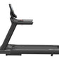 Black Precor commercial treadmill with digital display console, wide running belt, and adjustable incline, photographed on wh