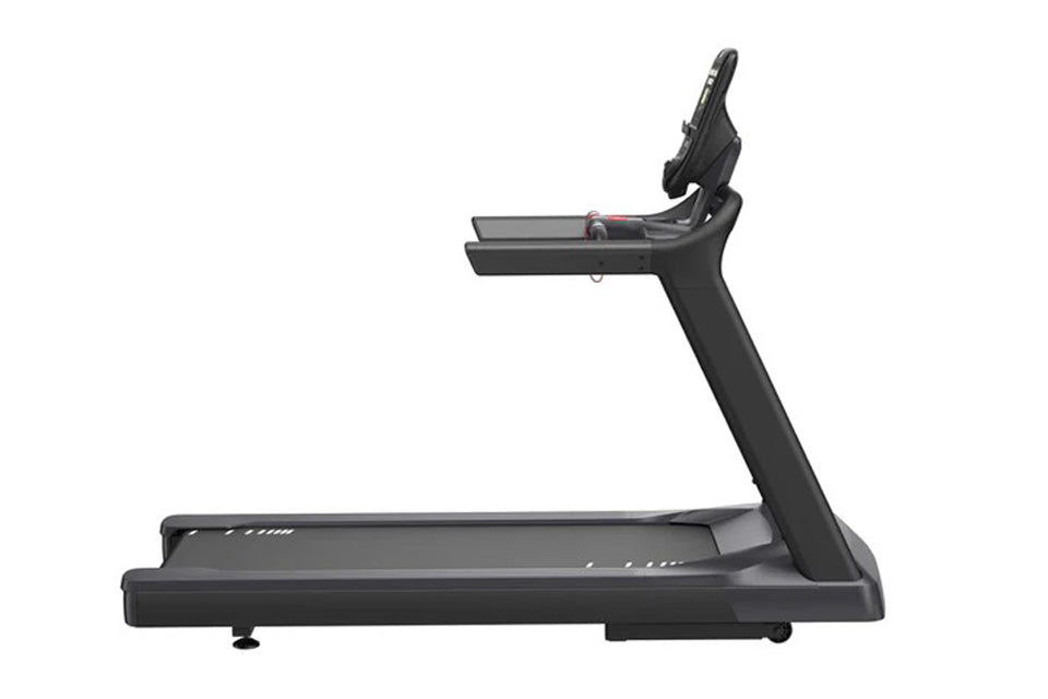 Black commercial treadmill with wide running deck, digital console, and adjustable incline lever on white background