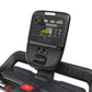 Black Precor TRM 531 treadmill with digital display console showing metrics, control buttons, and red emergency stop clip on 