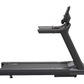 Black commercial treadmill with digital console, wide running deck, and adjustable upright handlebar on white background
