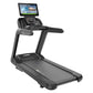 Black commercial treadmill with touchscreen console display, handrails, and running deck, on white background
