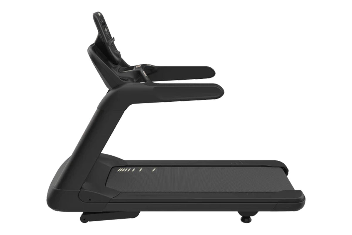Black commercial treadmill with dual handles and textured running surface on white background