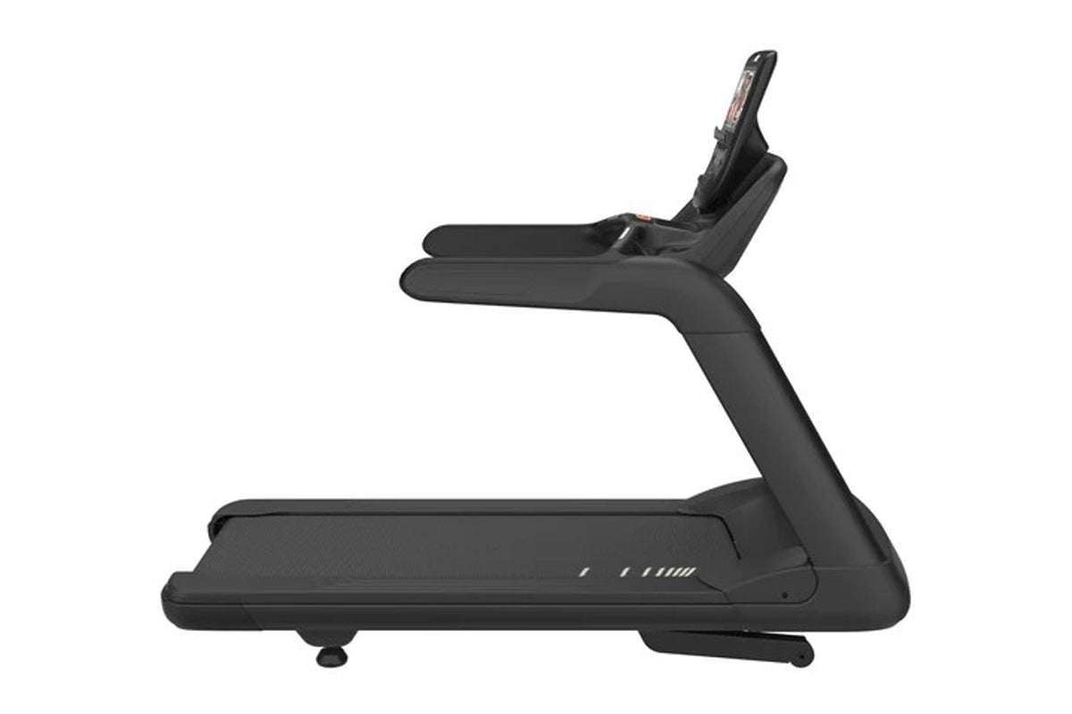 Black commercial treadmill with cushioned deck, dual handrails, and digital console display on white background