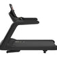 Black commercial treadmill with curved frame, digital console, and cushioned running deck on white background