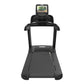 Black commercial treadmill with digital display console showing workout screen, textured running belt, and handrails on white