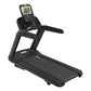 Black commercial treadmill with digital console display showing workout metrics, cushioned running belt, and adjustable handr