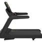 Black commercial treadmill with digital console and dual handrails on white background