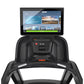Black Precor TRM 895 treadmill with integrated touchscreen console displaying fitness interface and workout programs