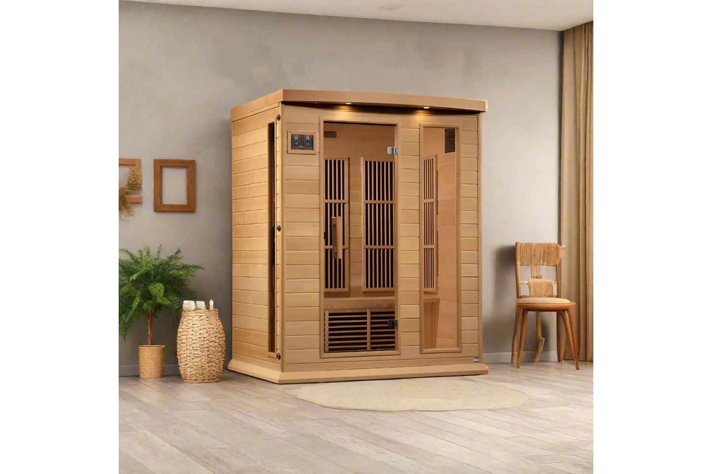 Cedar wood 3-person infrared sauna with black interior vents and digital control panel in modern room setting
