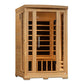 Two-person infrared sauna with natural wood construction, glass front doors, wooden benches, and black heating panels visible