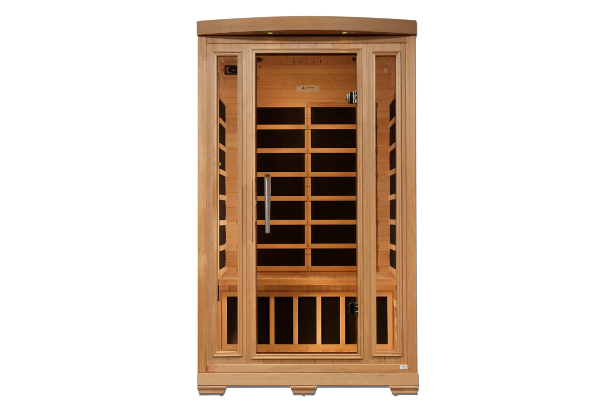 Natural wood two-person infrared sauna with glass front doors, wooden benches, and side vents on white background