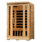 Natural wood two-person infrared sauna with glass door, cedar interior, black heating elements, and digital control panel on 