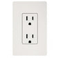 White wall outlet with dual electrical receptacles and black metal frame on light background
