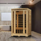 Natural wood 2-person infrared sauna with glass front door and black interior benches, displayed in modern bathroom setting