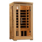 Natural wood infrared sauna cabin with glass front door, wooden bench seating, and metal handle on white background