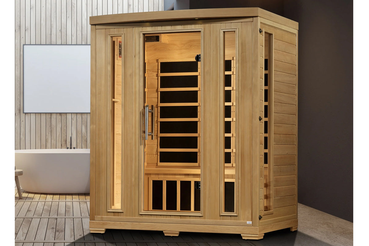 Natural wood infrared sauna cabin with glass door panel, wooden benches visible inside, and heating elements displayed on fro