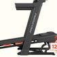ProForm Carbon Pro 2000 black treadmill with red accents and digital display, side view on white background